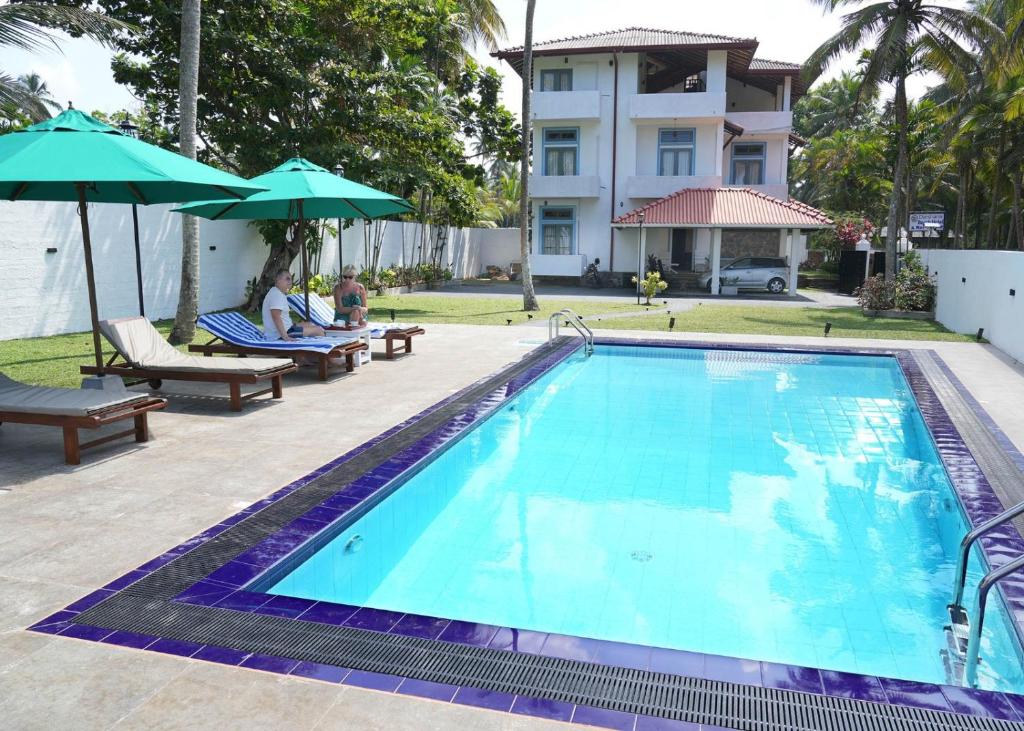 Bazén v ubytování Darshana Beach Hotel nebo v jeho okolí