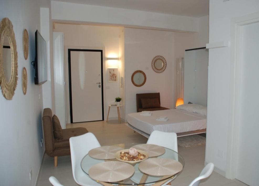 Ένα ή περισσότερα κρεβάτια σε δωμάτιο στο Sere Sea Home Rome