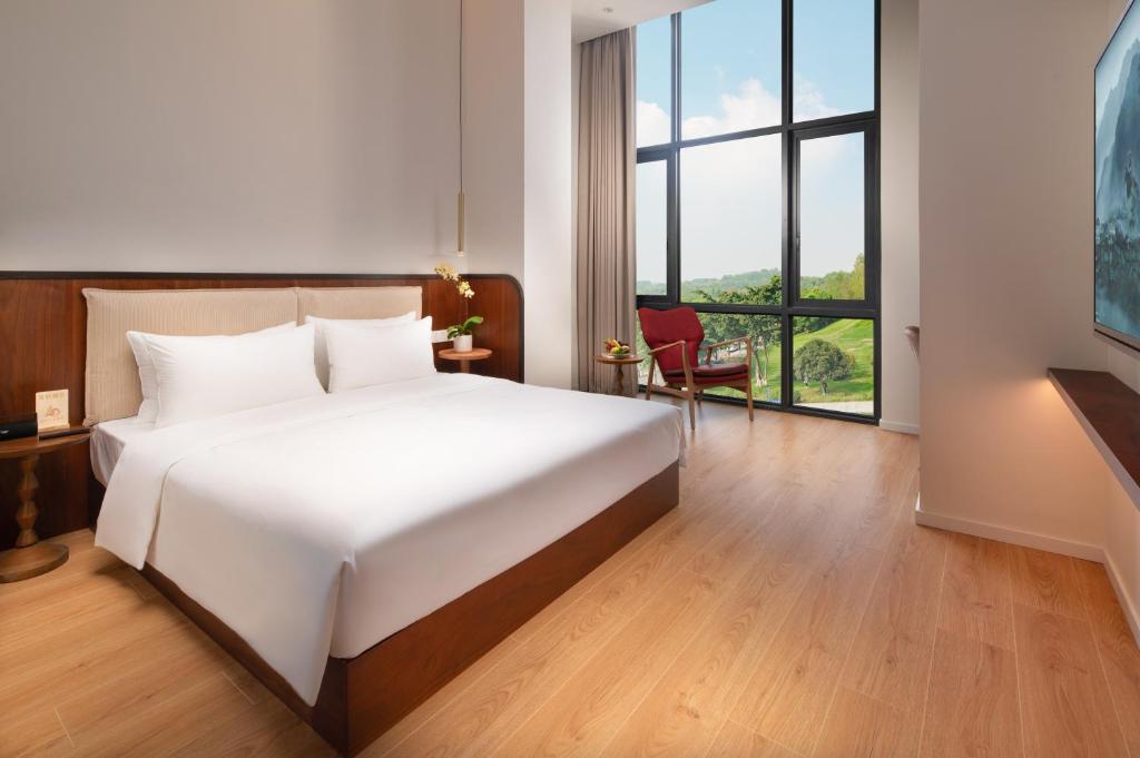 Katil atau katil-katil dalam bilik di Wuyu Hotel, Smart Park & Happy Valley Jinshansi Metro