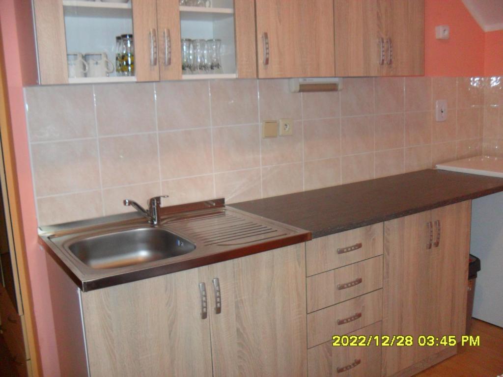 Kuchyň nebo kuchyňský kout v ubytování Apartmány Prima