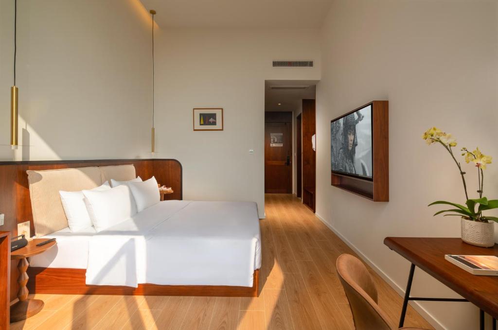 Televisyen dan/atau pusat hiburan di Wuyu Hotel, Smart Park & Happy Valley Jinshansi Metro