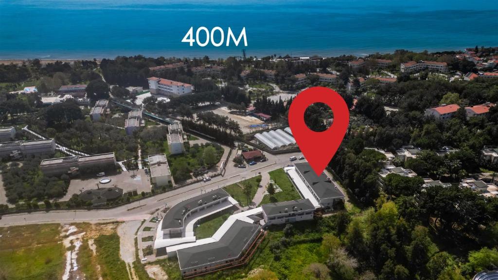 a red map of a city with a town at SEASIDE APART OTEL- 400 meter to sea! in Side
