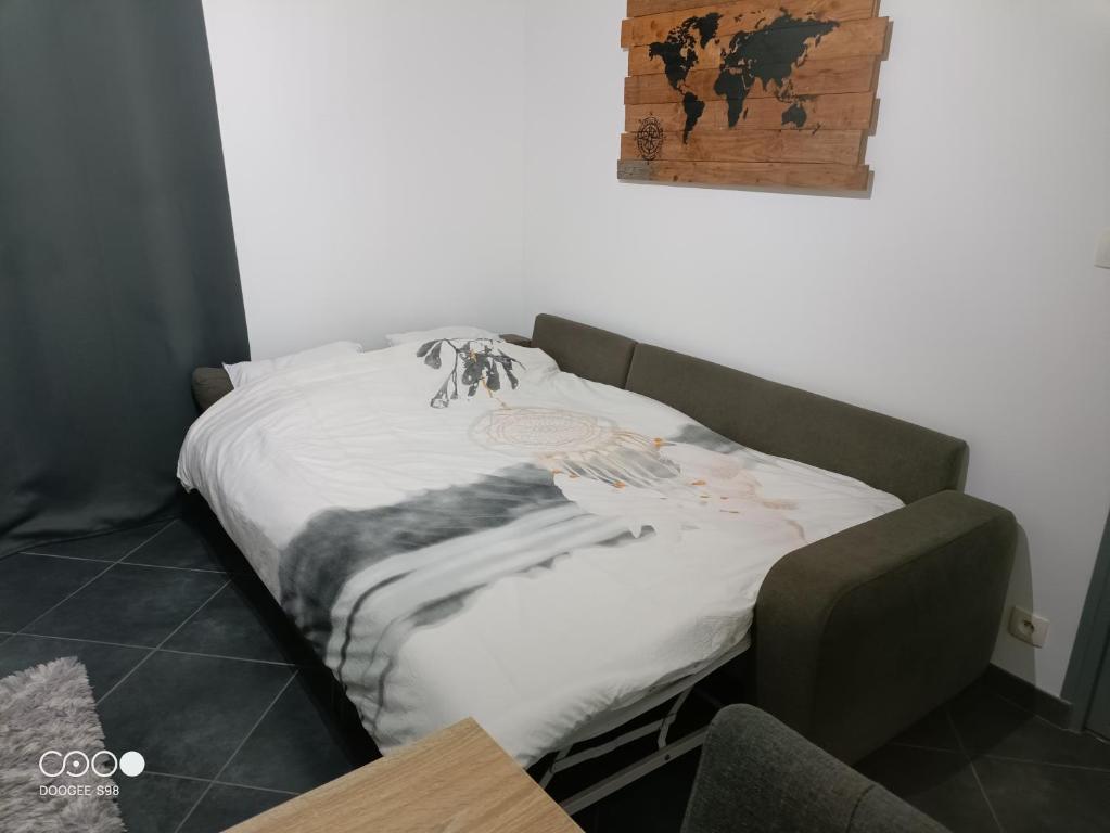 Postel nebo postele na pokoji v ubytování Logement au coeur de l'Auvergne