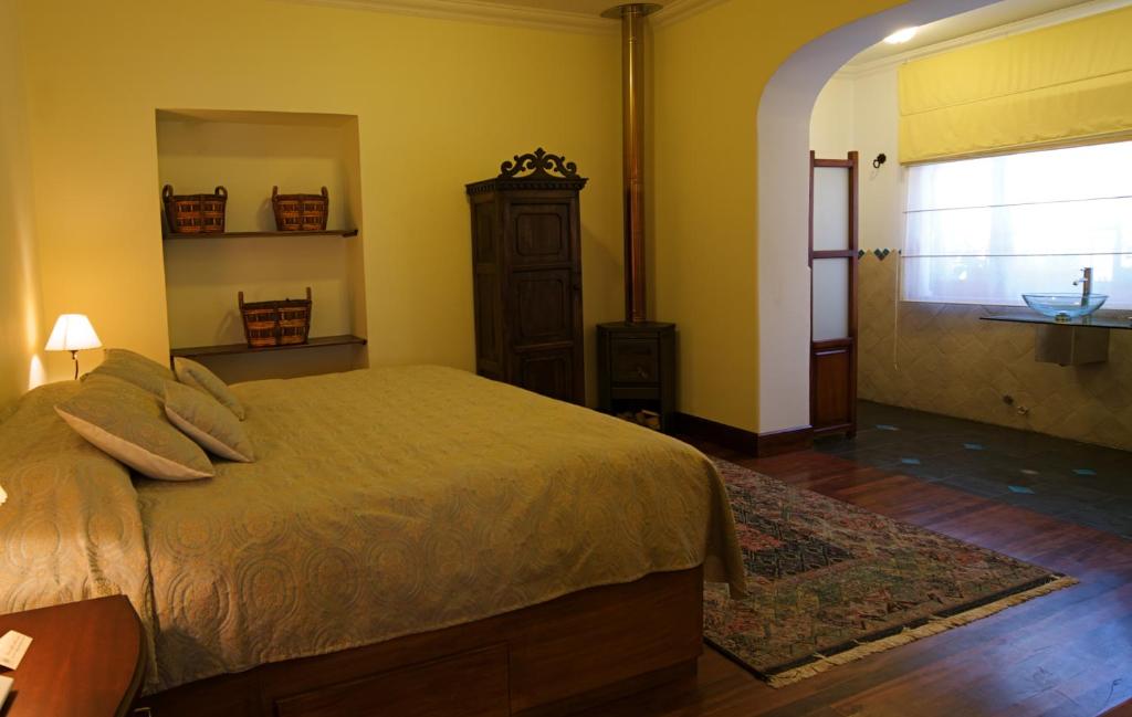 Postel nebo postele na pokoji v ubytování Boutique Hotel Casa Foch