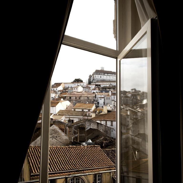 Nespecifikovaný výhled na destinaci Coimbra nebo výhled na město při pohledu z hotelu
