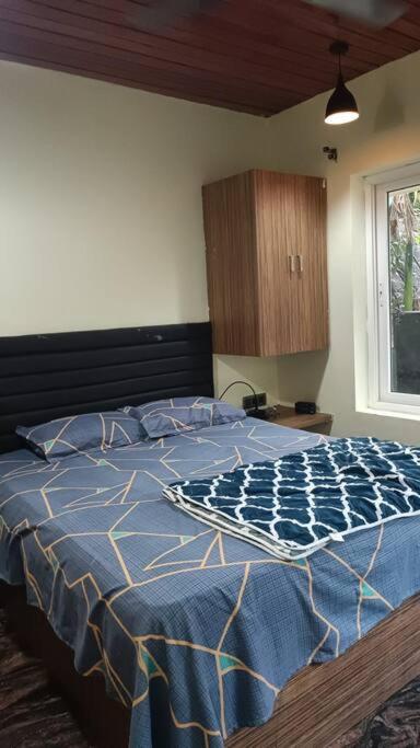 Postel nebo postele na pokoji v ubytování Serene Valley Resort-II