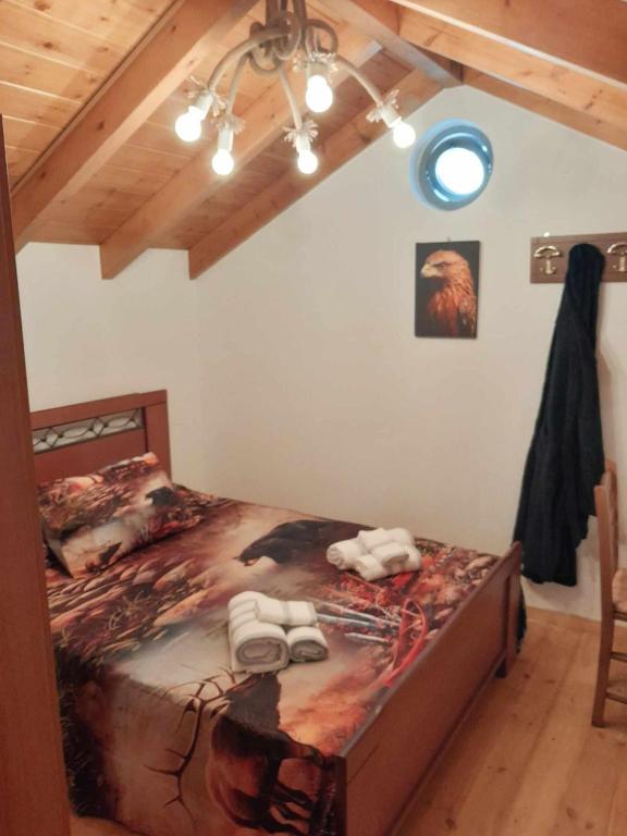 Postel nebo postele na pokoji v ubytování "Zeus House" Sevasti Symi Studios