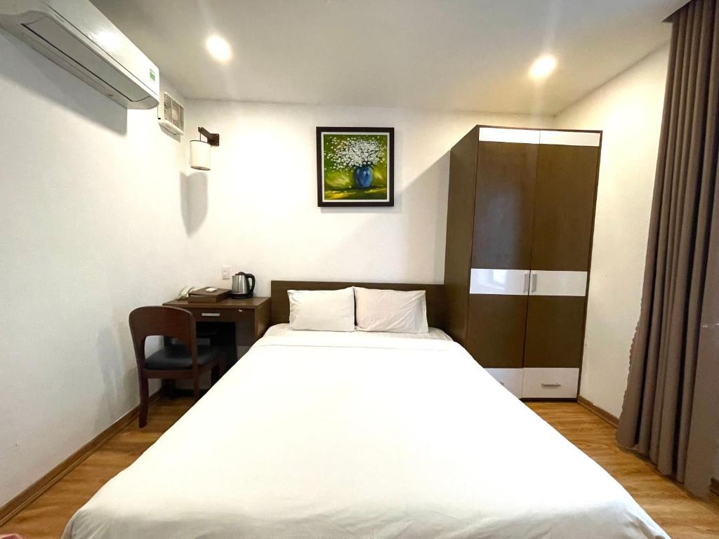 Postel nebo postele na pokoji v ubytování Silana Beachfront Hotel & Spa