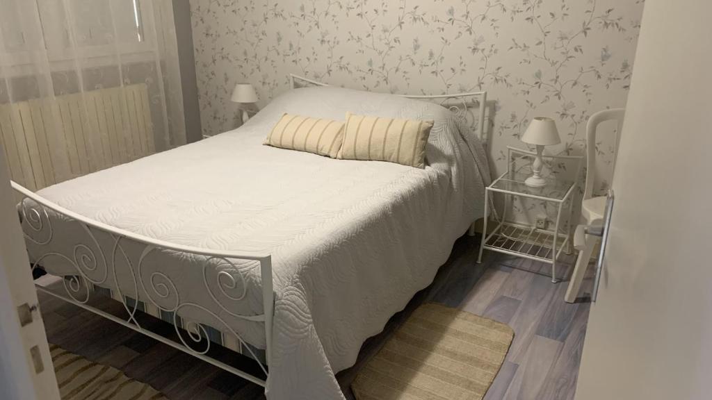 Ένα ή περισσότερα κρεβάτια σε δωμάτιο στο Appartement 2 chambres a 200 m de la mer