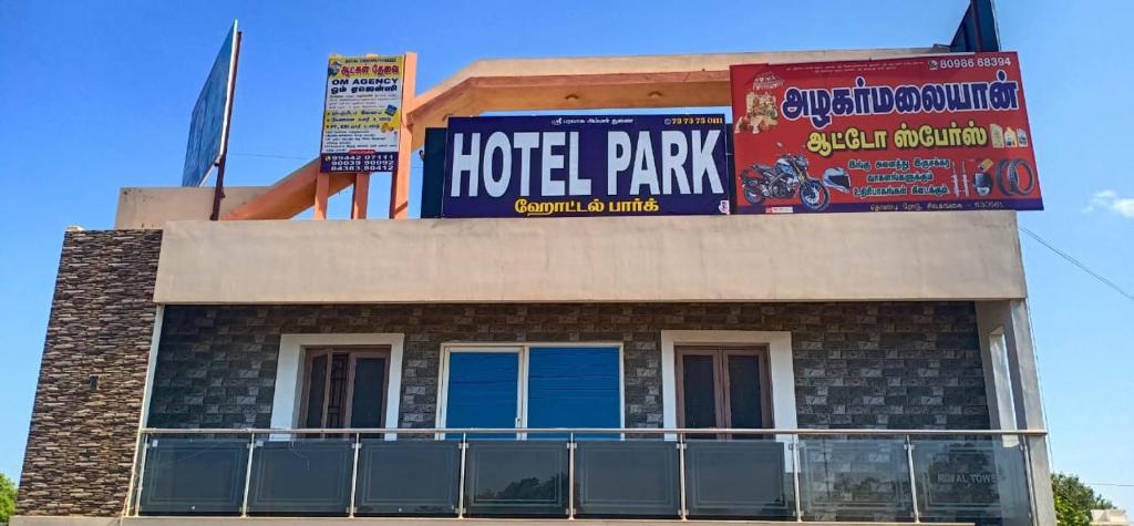 a hotel park sign on top of a building at Hotel Park Sivagangai in Sivaganga