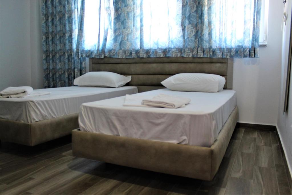 Postel nebo postele na pokoji v ubytování Hotel Orange