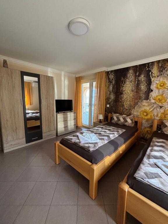 Postel nebo postele na pokoji v ubytování Apartmani "MARIJA" Golubac