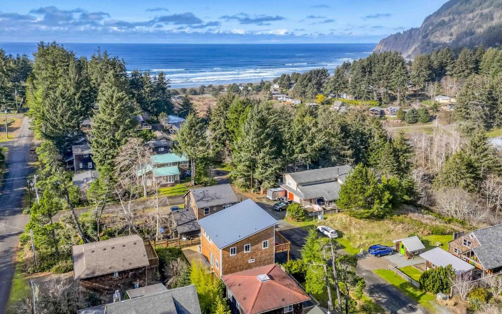 an aerial view of a small town with houses and the ocean at Casabonita (MCA #50604) in Manzanita