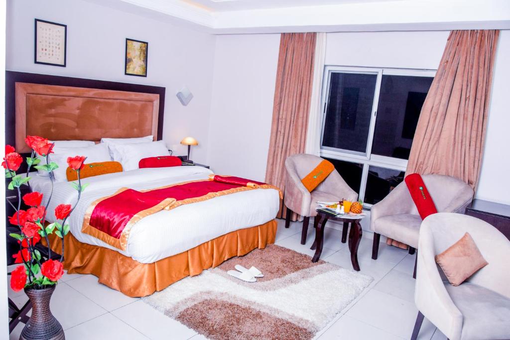 Postel nebo postele na pokoji v ubytování LIMEWOOD HOTEL
