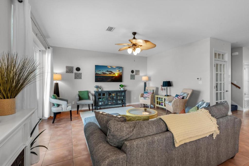 a living room with a couch and a table at Bonita Bay in Pensacola Beach