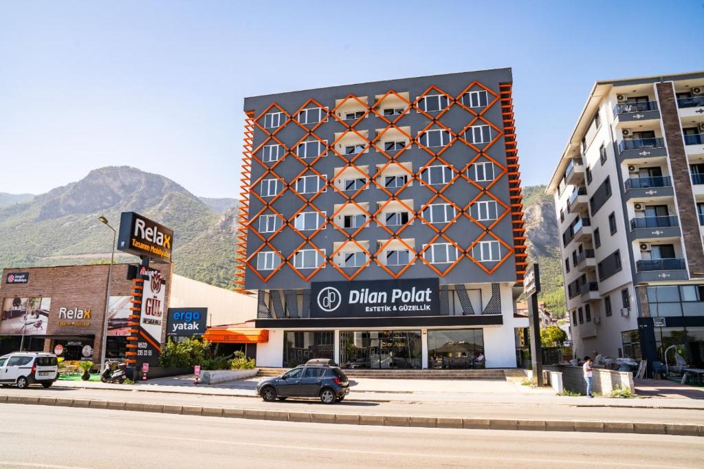 a building with a sign that reads dim project at GÜL RESİDENCE in Zeytinkoy