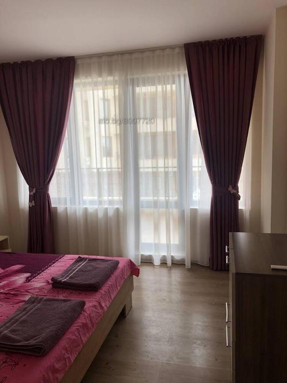Postel nebo postele na pokoji v ubytování Комплекс Рич 2
