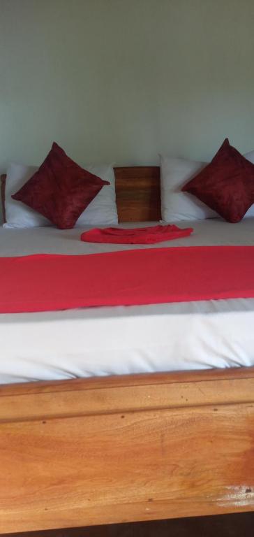 Postel nebo postele na pokoji v ubytování Himansa Homestay