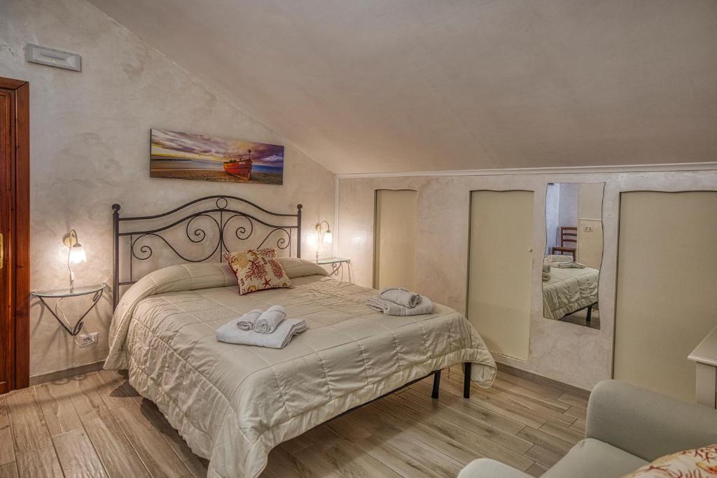 Uma cama ou camas num quarto em Le Marelle