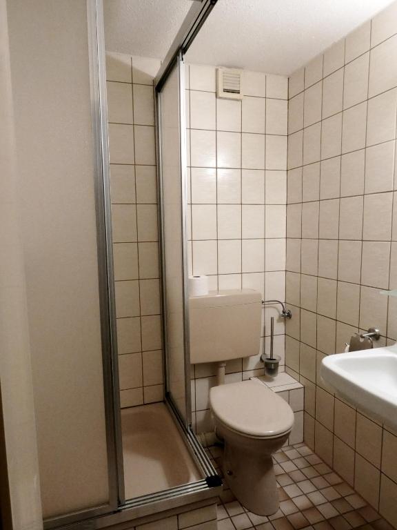 Koupelna v ubytování Roastineer Hotel