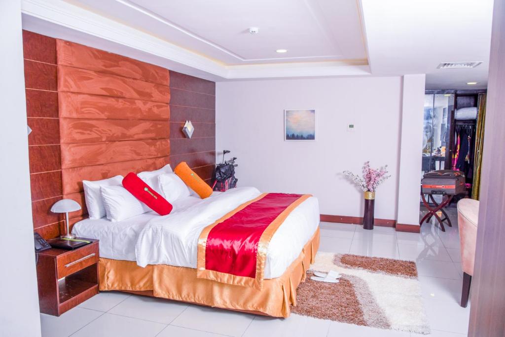 Postel nebo postele na pokoji v ubytování LIMEWOOD HOTEL