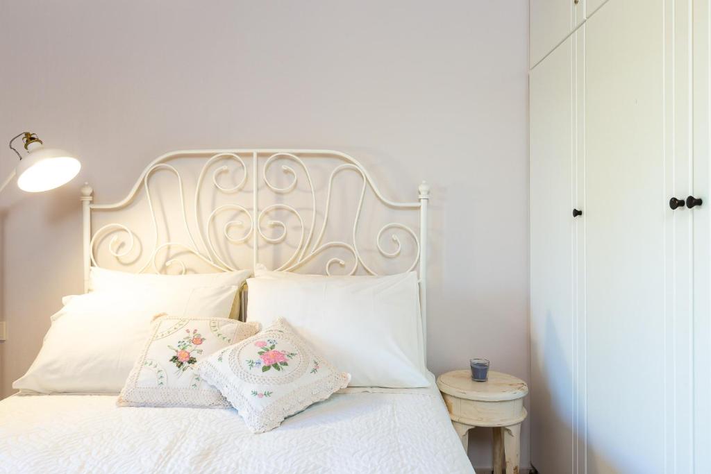A bed or beds in a room at Villa Elli