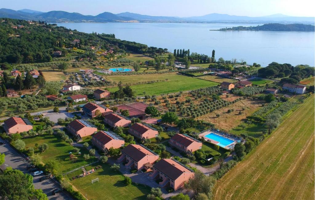 an aerial view of a resort near the water at Lovely Apartment In San Feliciano in San Feliciano