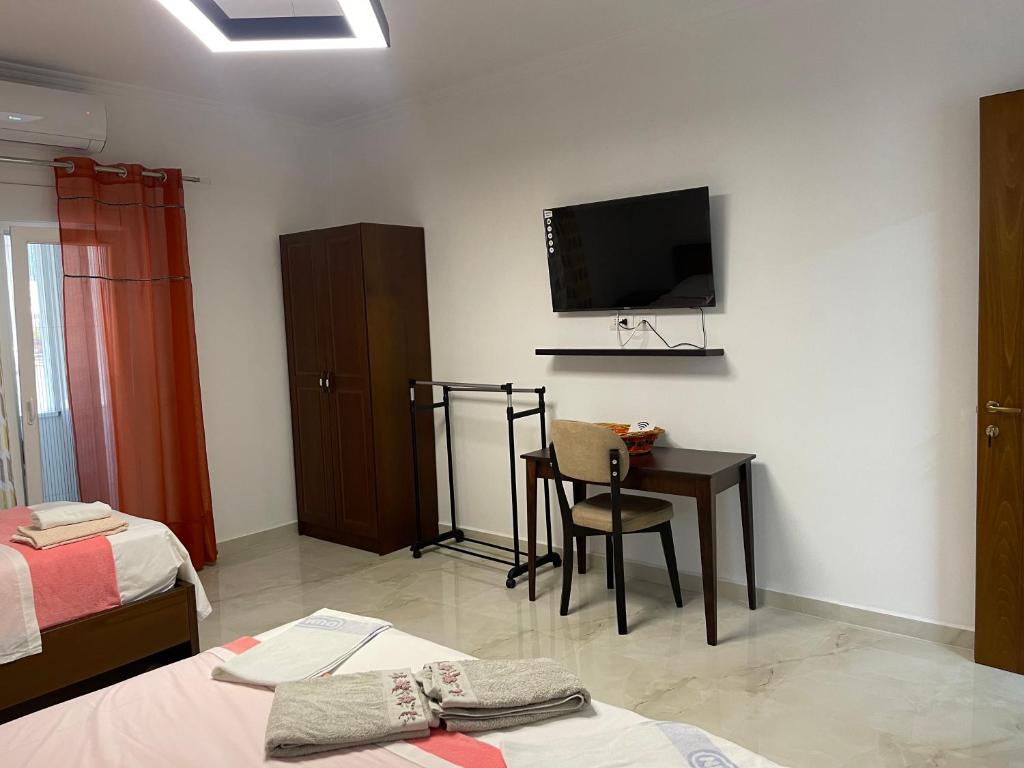 Ein Bett oder Betten in einem Zimmer der Unterkunft Hotel Vila C plus plus
