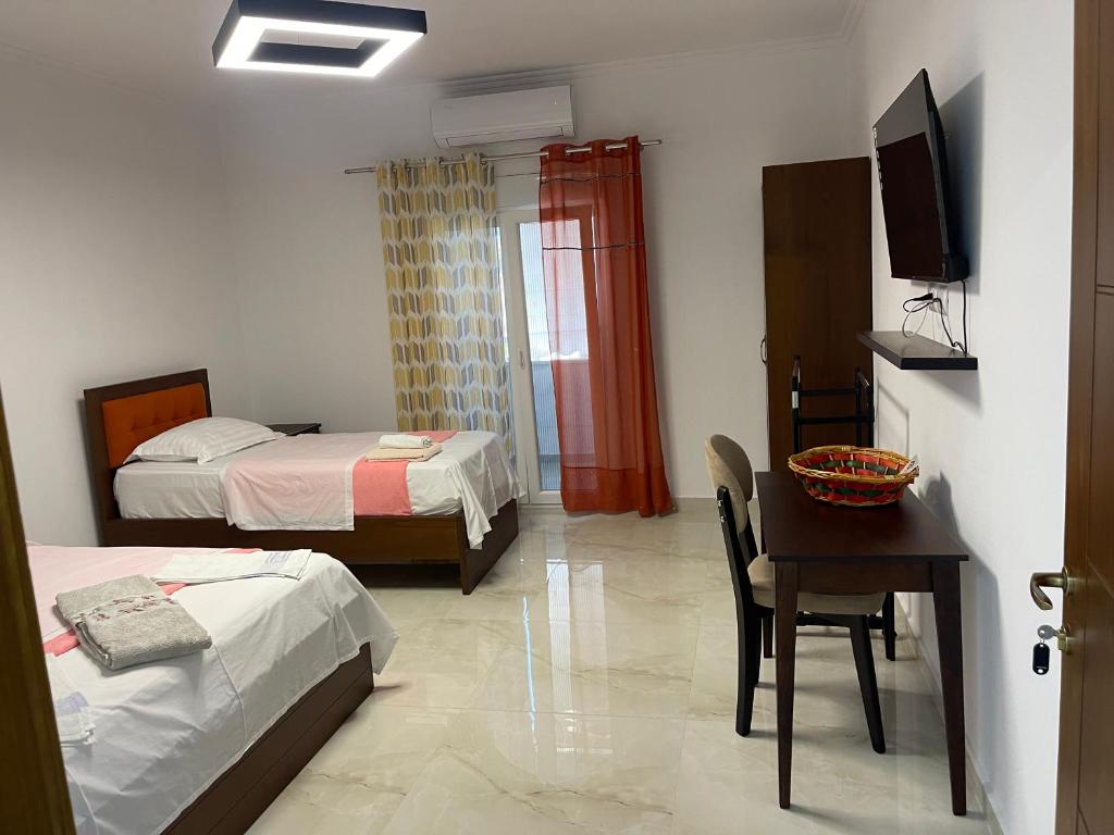 Ein Bett oder Betten in einem Zimmer der Unterkunft Hotel Vila C plus plus