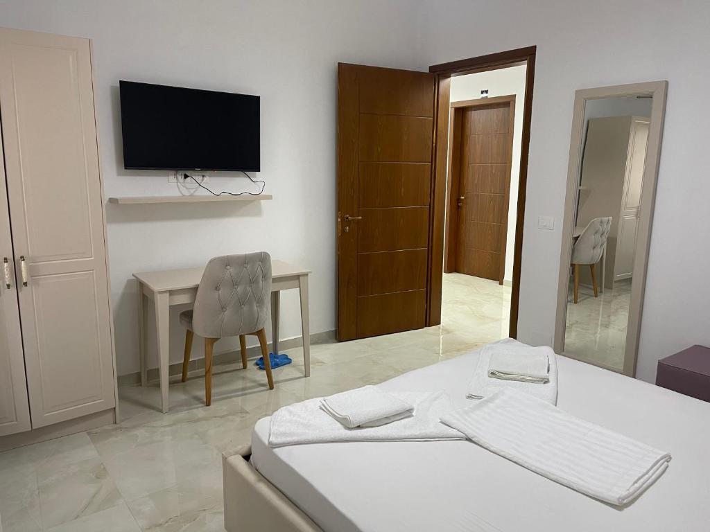 Ein Bett oder Betten in einem Zimmer der Unterkunft Hotel Vila C plus plus