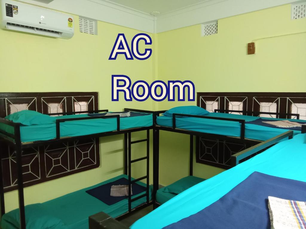 a group of bunk beds in a room at Sili hostel in Siliguri
