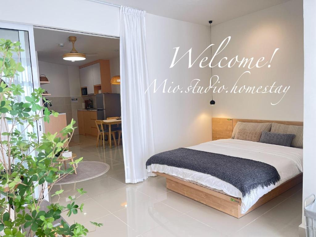 Postel nebo postele na pokoji v ubytování Cozy Ocean View APT in KK City Center