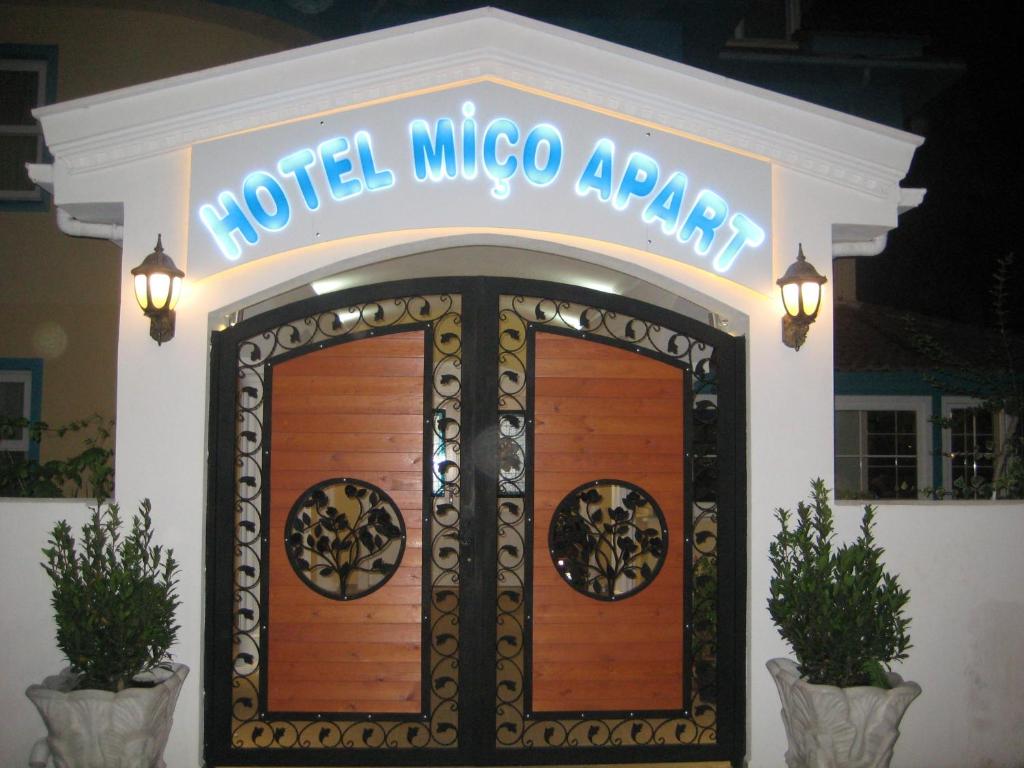 a sign that reads motel mico arena in front of a building at Hotel Mico in Dalyan