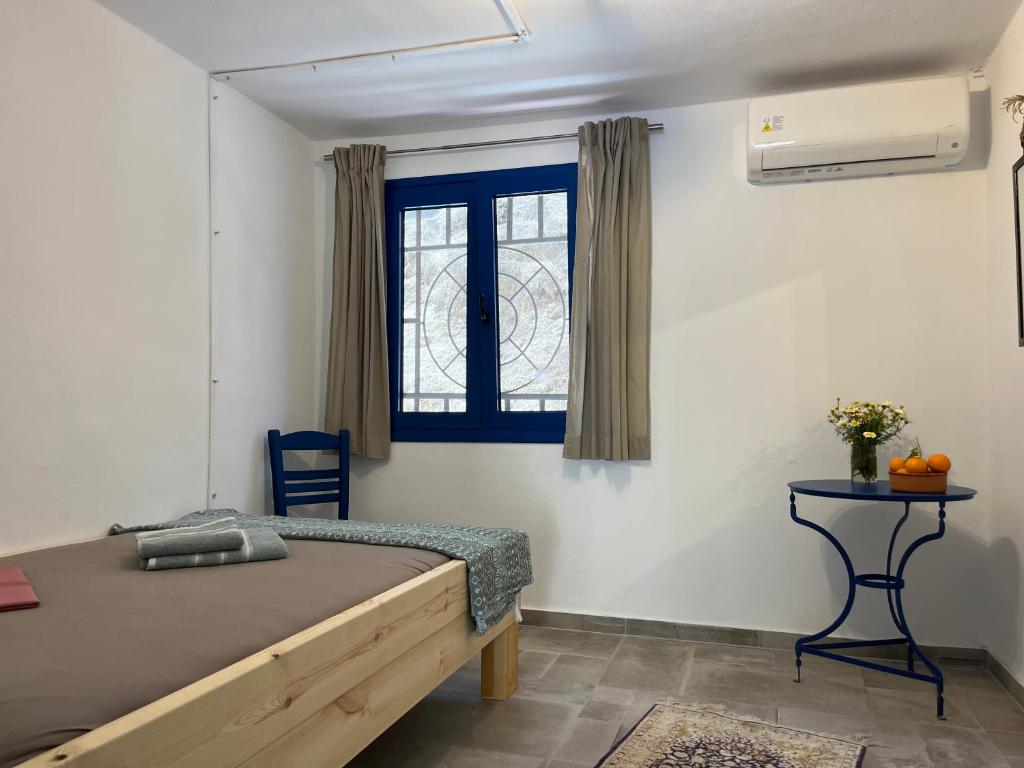 Postel nebo postele na pokoji v ubytování Ferienhaus Asterousia