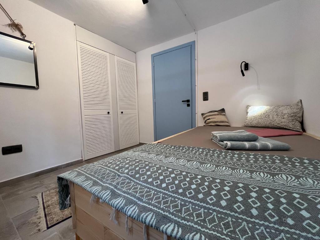 Postel nebo postele na pokoji v ubytování Ferienhaus Asterousia