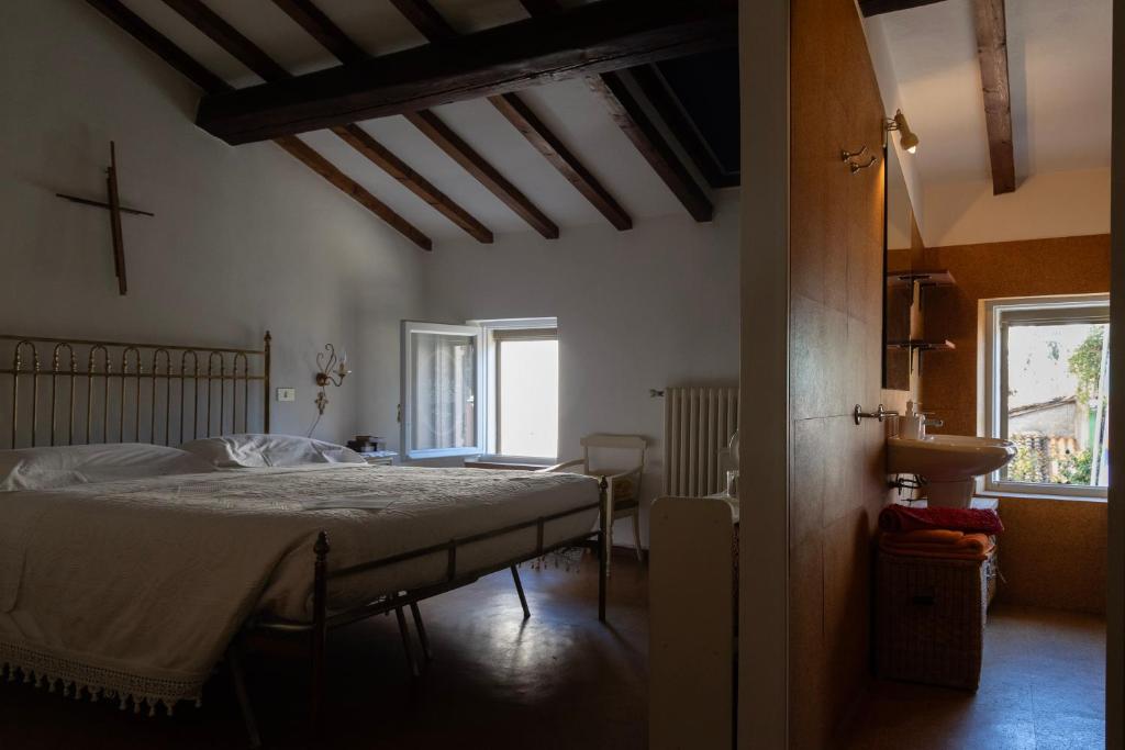 B&B Casanonni Borgo Angeli 객실 침대