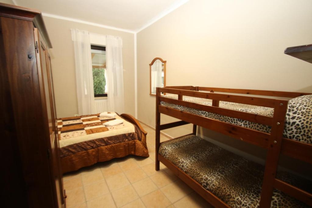 Ostello Del Volo - Quadruple Room With Shared Bathroom