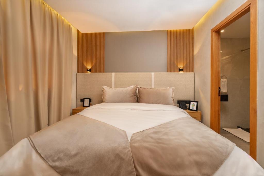Postel nebo postele na pokoji v ubytování Appart Hôtel Rambla