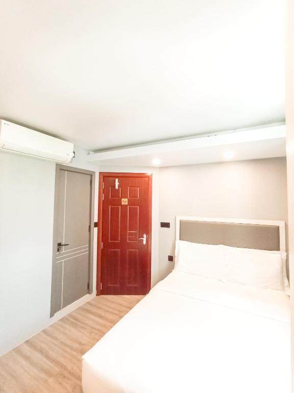 Postel nebo postele na pokoji v ubytování Starry Beach Inn