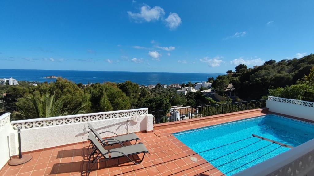 a swimming pool on the balcony of a house at Casa Alberto - Altea in Altea