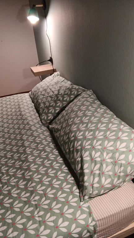 Postel nebo postele na pokoji v ubytování LaelleApartament Rho Fiera San Siro