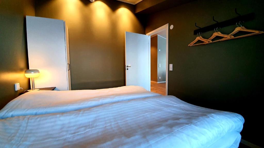 Кровать или кровати в номере Katterjåkk Apartments