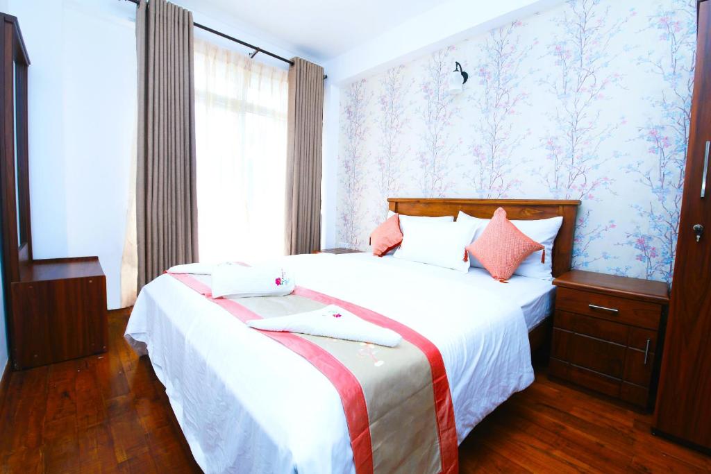 Postel nebo postele na pokoji v ubytování Nelma's Cosy