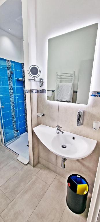 Koupelna v ubytování Hotel Blu Eden