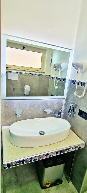 Koupelna v ubytování Hotel Blu Eden