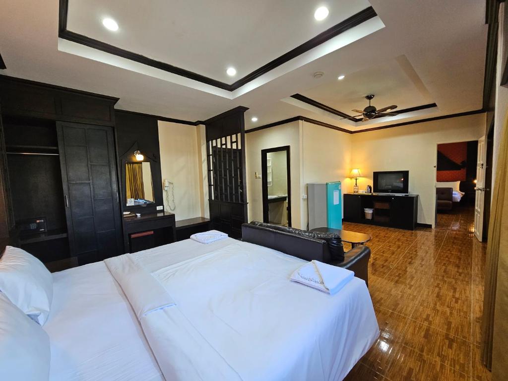 Postel nebo postele na pokoji v ubytování Nanai 2 Residence Patong Phuket