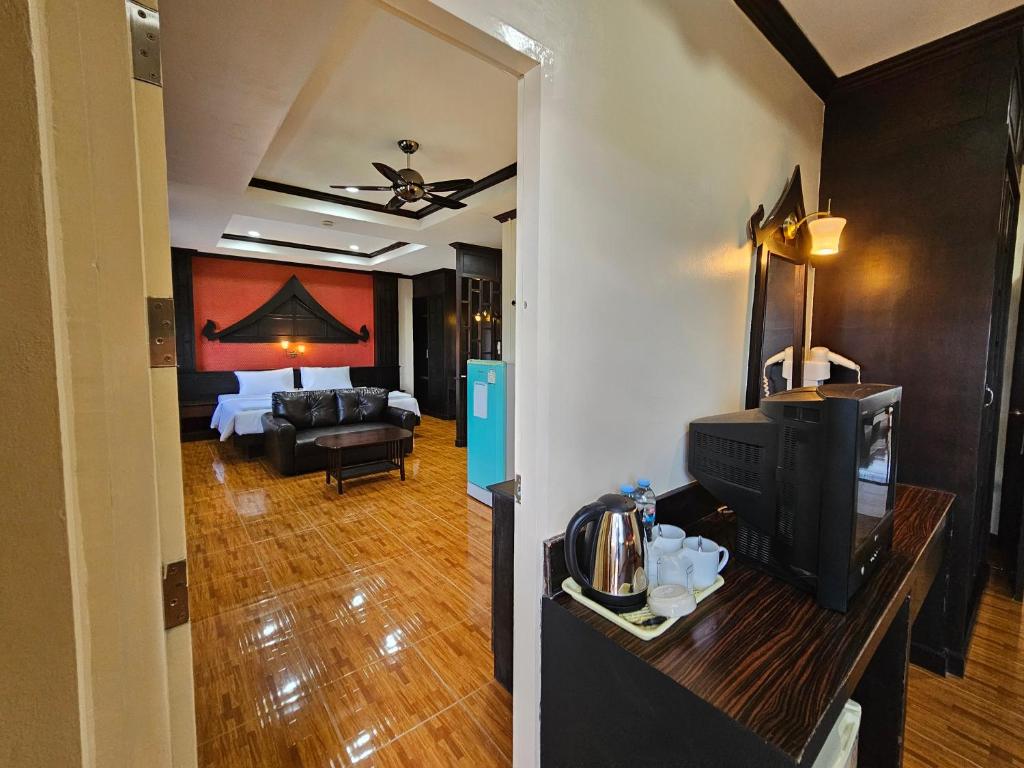 Postel nebo postele na pokoji v ubytování Nanai 2 Residence Patong Phuket