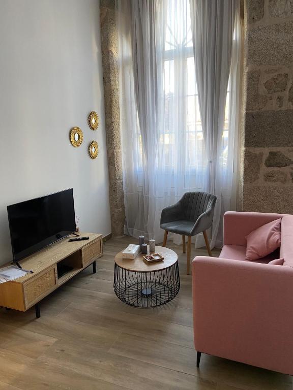 TV a/nebo společenská místnost v ubytování Reginita Apartamentos