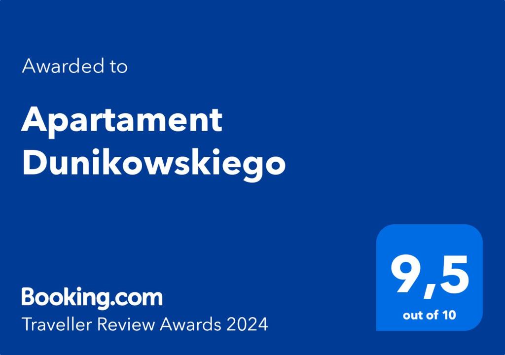 a blue sign with the words apartment dunkwerkico at Apartament Dunikowskiego 57m2 in Lublin