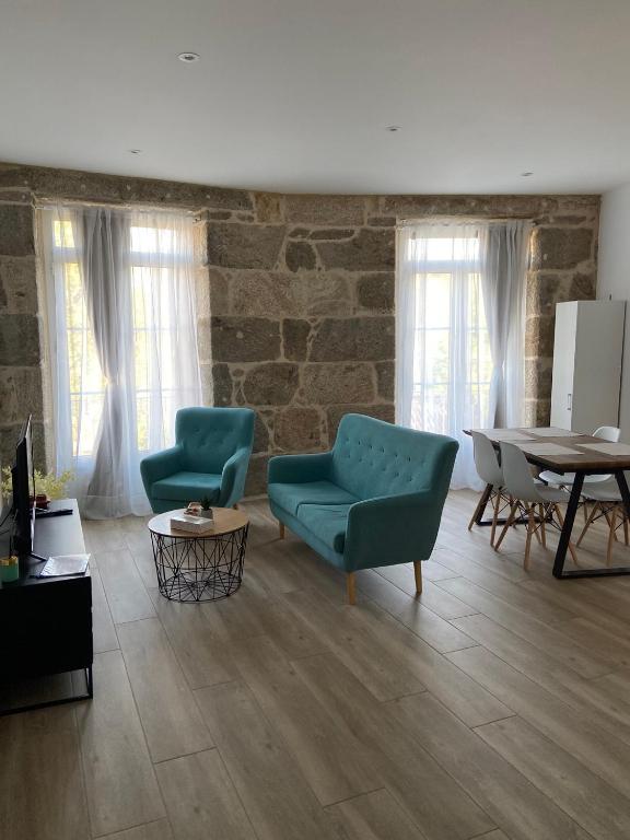 Posezení v ubytování Reginita Apartamentos